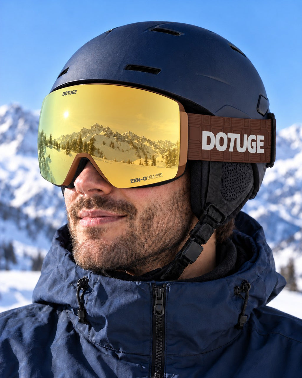 Alpine 2 | Snow Goggles | Photochromic Cylindrical Lens, UV400 Protection | Skiing and Snowboarding-Gold Lens / Brown Frame / Brown Strap – worn with a ski helmet, close-up – Snowgest