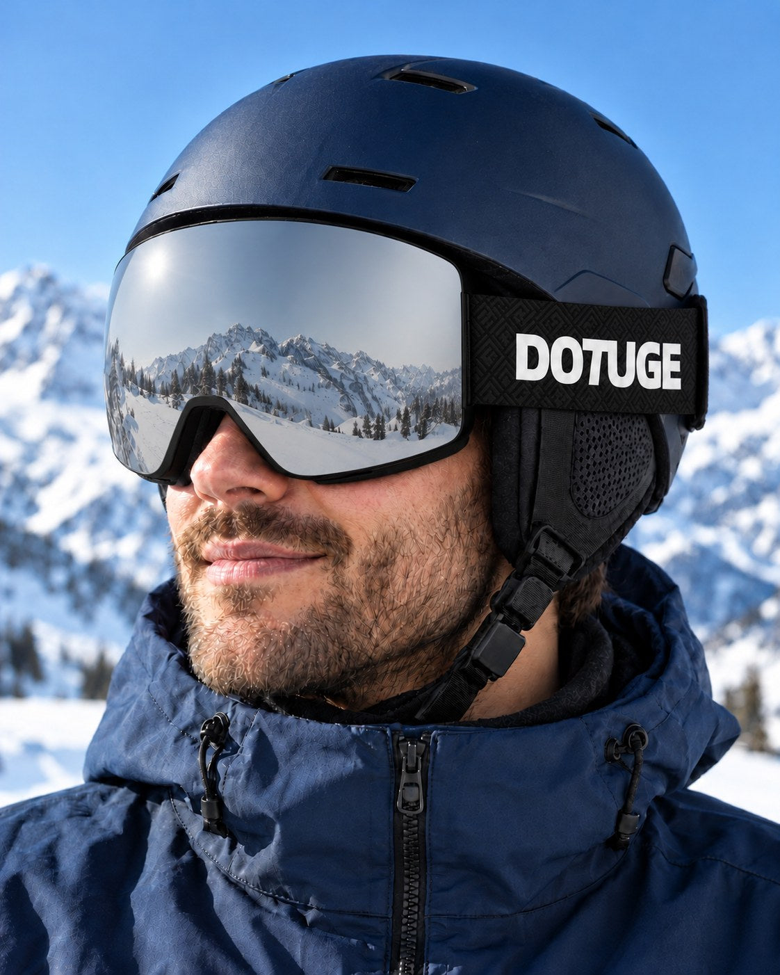 Ridge | Snow Goggles | Cylindrical Lens, UV400 Protection | Skiing and Snowboarding-Silver Lens / Black Frame / Black Strap – worn with a ski helmet, close-up – Snowgest